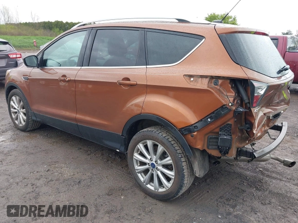 2017 Ford Escape Titanium with VIN 1FMCU0JD3HUB20846, listed as a IAAI auction lot 42182260 with 28,610 mi miles and . Bid and sale history available at DreamBid. Image 3.