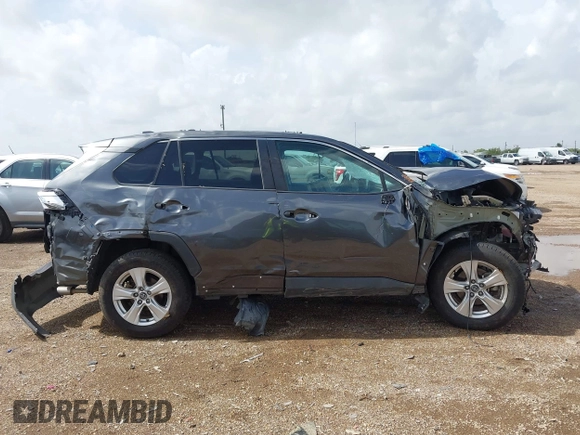 2021 Toyota RAV4 XLE with VIN 2T3W1RFV5MC104078, listed as a IAAI auction lot 42591343 with 57,057 mi miles and . Bid and sale history available at DreamBid. Image 14.