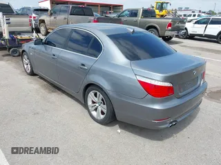 2010 BMW 5 Series 528i with VIN WBANU5C52AC129062, listed as a IAAI auction lot 42087362 with 200,403 mi miles and . Bid and sale history available at carsss.com. Image 3.