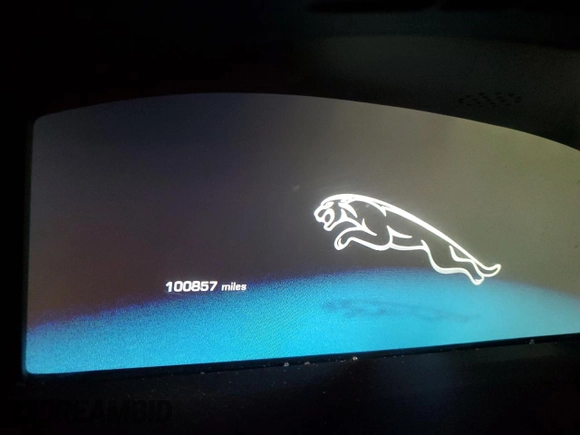 2014 Jaguar XJ Portfolio with VIN SAJWJ2GD2E8V69597, listed as a Copart auction lot 57798145 with 100,857 mi miles and Salvage title. Bid and sale history available at DreamBid. Image 9.