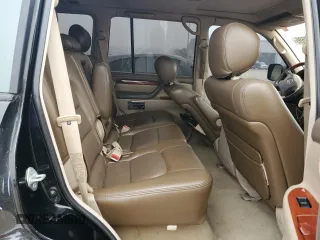 2001 Lexus LX 470 z VIN JTJHT00W513509447, wystawiony jako Copart lot #43988595 z przebiegiem 251 861 mil mil oraz Tytuł czysty. Historia ofert i sprzedaży dostępna na DreamBid. Obrazek 11.