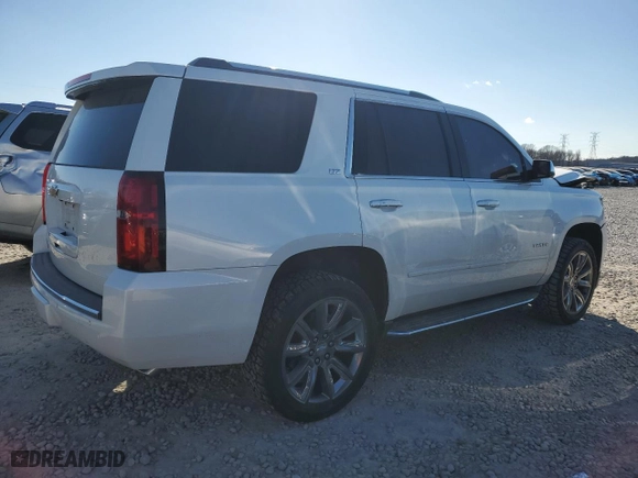 2016 Chevrolet Tahoe LTZ with VIN 1GNSKCKC1GR254325, listed as a Copart auction lot 41833005 with 115,144 mi miles and Salvage Title. Bid and sale history available at carsss.com. Image 3.