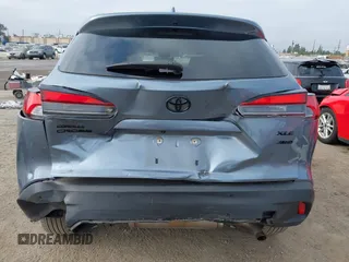 2022 Toyota Corolla Cross XLE with VIN 7MUDAABG6NV007009, listed as a IAAI auction lot 42409061 with 37,178 mi miles and . Bid and sale history available at DreamBid. Image 6.