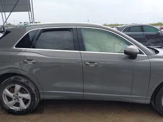 2020 Audi Q3 Premium z VIN WA1AECF30L1052472, wystawiony jako IAAI lot #41886809 z przebiegiem 101 600 mil mil oraz . Historia ofert i sprzedaży dostępna na DreamBid. Obrazek 13.