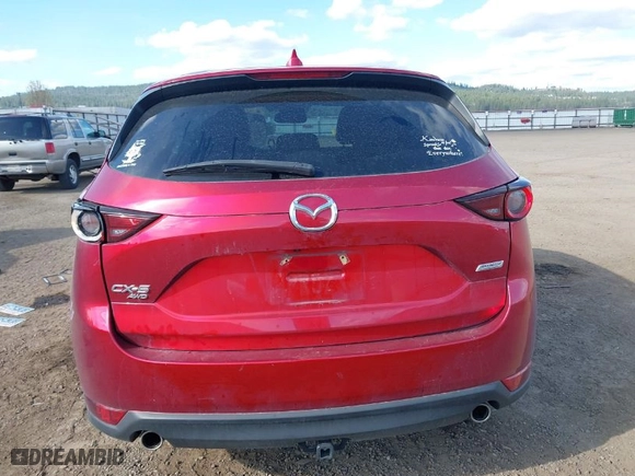 2019 Mazda CX-5 Touring with VIN JM3KFBCMXK1658009, listed as a IAAI auction lot 42028300 with 33,419 mi miles. Bid and sale history available at carsss.com. Image 16.