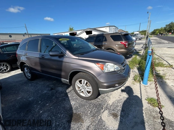 2011 Honda CR-V EX-L z VIN 5J6RE4H74BL060649, wystawiony jako Copart lot #61692905 z przebiegiem 183 943 mil mil oraz Czysty tytuł • Clean title. Historia ofert i sprzedaży dostępna na DreamBid. Obrazek 1.