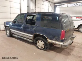 1996 Chevrolet Tahoe with VIN 1GNEK13R3TJ359476, listed as a IAAI auction lot 39579992 with 258,505 mi miles. Bid and sale history available at carsss.com. Image 3.