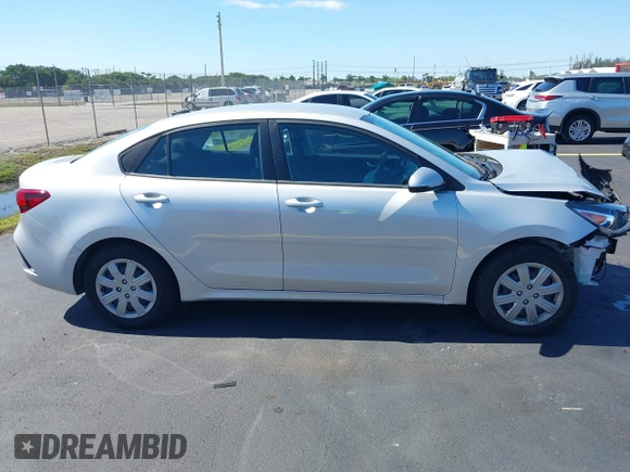 2023 Kia Rio S z VIN 3KPA24AD4PE592446, wystawiony jako IAAI lot #42244022 z przebiegiem 13 759 mil mil oraz . Historia ofert i sprzedaży dostępna na DreamBid. Obrazek 14.
