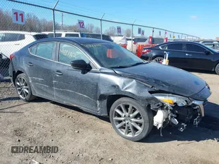 2018 Mazda 3 Touring with VIN 3MZBN1V39JM248441, listed as a IAAI auction lot 41888862 with 92,618 mi miles and . Bid and sale history available at DreamBid. Image 1.