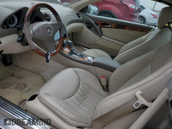 2009 Mercedes-Benz SL 550 with VIN WDBSK71F49F143492, listed as a Copart auction lot 88757425 with 89,117 mi miles and Salvage title. Bid and sale history available at DreamBid. Image 8.