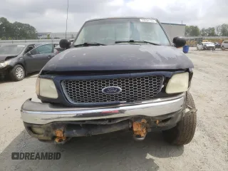 2002 Ford F-150 XL z VIN 1FTRX18L12NB86774, wystawiony jako Copart lot #59634165 z przebiegiem 262 567 mil mil oraz Szkoda całkowita • Salvage title. Historia ofert i sprzedaży dostępna na DreamBid. Obrazek 5.