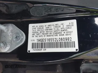 2002 Honda Civic LX with VIN 1HGES16552L060982, listed as a IAAI auction lot 42141884 with 202,659 mi miles and . Bid and sale history available at DreamBid. Image 9.