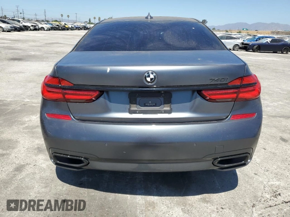 2018 BMW 7 Series 740i with VIN WBA7E2C59JG742809, listed as a Copart auction lot 66995934 with 62,017 mi miles and Salvage Title. Bid and sale history available at carsss.com. Image 6.
