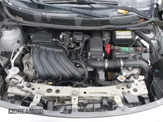 2013 Nissan Versa S Plus z VIN 3N1CN7AP9DL838834, wystawiony jako IAAI lot #41959162 z przebiegiem 94 906 mil mil oraz . Historia ofert i sprzedaży dostępna na DreamBid. Obrazek 10.