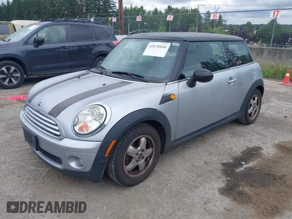 2007 MINI Hardtop with VIN WMWMF33557TU61953, listed as a IAAI auction lot 42678840 with 139,665 mi miles and . Bid and sale history available at DreamBid. Image 2.