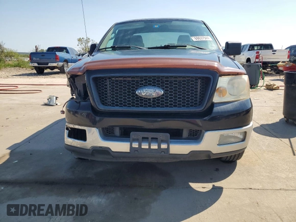 2004 Ford F-150 XLT with VIN 1FTRX12574KB94473, listed as a Copart auction lot 69637544 with 149,044 mi miles and Salvage Title. Bid and sale history available at carsss.com. Image 5.