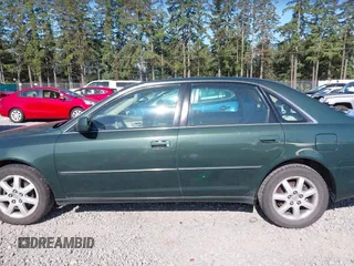 2000 Toyota Avalon XL z VIN 4T1BF28B2YU092348, wystawiony jako IAAI lot #42271599 z przebiegiem 179 560 mil mil oraz . Historia ofert i sprzedaży dostępna na DreamBid. Obrazek 15.