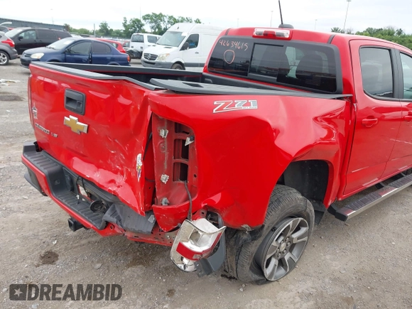 2020 Chevrolet Colorado 4WD Z71 with VIN 1GCGTDEN9L1105636, listed as a IAAI auction lot 42634615 with 106,469 mi miles and . Bid and sale history available at DreamBid. Image 6.