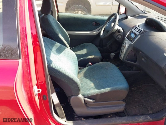 2007 Toyota Yaris with VIN JTDJT923775034473, listed as a IAAI auction lot 41598782 with 203,121 mi miles. Bid and sale history available at carsss.com. Image 5.