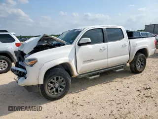 2020 Toyota Tacoma SR5 with VIN 3TMAZ5CN3LM121394, listed as a Copart auction lot 58937145 with Not provided miles and Salvage title. Bid and sale history available at DreamBid. Image 1.