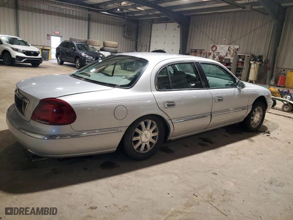 2001 Lincoln Continental with VIN 1LNHM97V51Y698794, listed as a Copart auction lot 47649315 with 84,465 mi miles and Salvage Title. Bid and sale history available at carsss.com. Image 3.