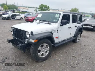 2021 Jeep Wrangler Unlimited Sport S with VIN 1C4HJXDG1MW850478, listed as a IAAI auction lot 42263715 with 31,284 mi miles and . Bid and sale history available at DreamBid. Image 17.