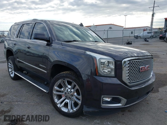 2017 GMC Yukon Denali with VIN 1GKS1CKJ0HR153941, listed as a IAAI auction lot 41300648 with 128,193 mi miles. Bid and sale history available at carsss.com. Image 1.