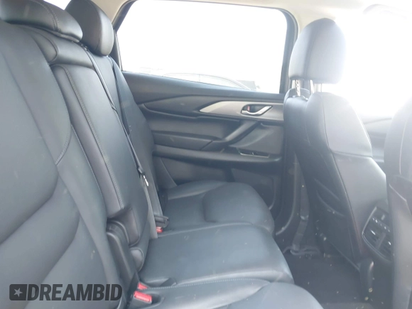 2023 Mazda CX-9 Touring Plus with VIN JM3TCBAY9P0657854, listed as a IAAI auction lot 41931409 with 54,036 mi miles and . Bid and sale history available at DreamBid. Image 8.