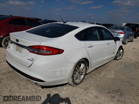 2018 Ford Fusion Hybrid SE with VIN 3FA6P0LU3JR141589, listed as a Copart auction lot 68377772 with 84,294 mi miles. Bid and sale history available at carsss.com. Image 3.