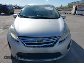 2012 Ford Fiesta SE with VIN 3FADP4BJ2CM150953, listed as a IAAI auction lot 42010904 with 77,637 mi miles. Bid and sale history available at carsss.com. Image 12.