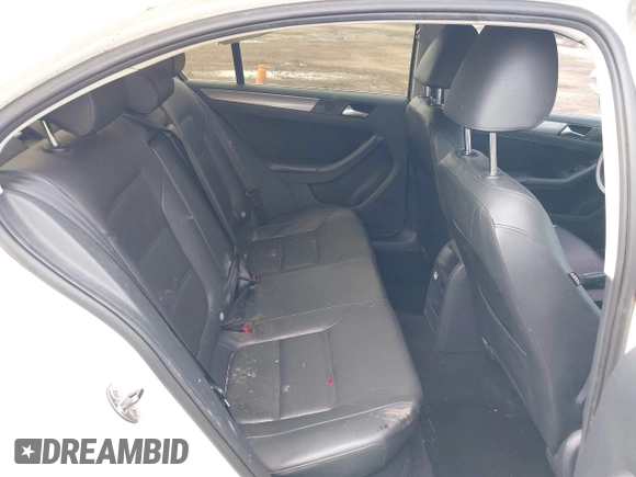2013 Volkswagen Jetta TDI w/Premium/Nav with VIN 3VWLL7AJ3DM418377, listed as a IAAI auction lot 42768223 with 149,241 mi miles and . Bid and sale history available at DreamBid. Image 8.
