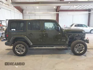 2021 Jeep Wrangler Unlimited Sahara z VIN 1C4HJXEN2MW592565, wystawiony jako IAAI lot #41956072 z przebiegiem 95 504 mil mil oraz . Historia ofert i sprzedaży dostępna na DreamBid. Obrazek 14.