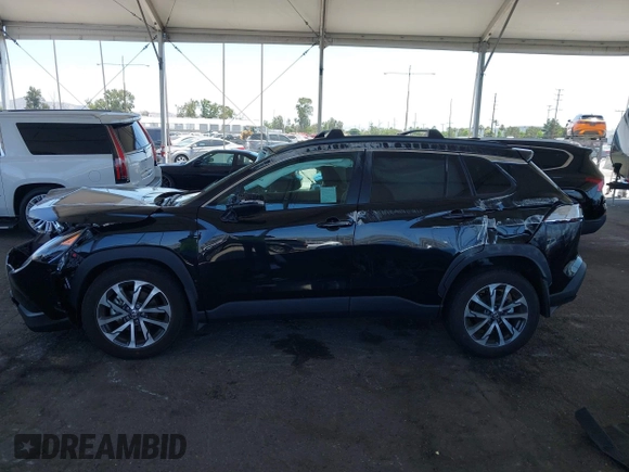 2023 Toyota Corolla Cross XLE with VIN 7MUDAAAG8PV072030, listed as a IAAI auction lot 42397573 with 6,584 mi miles and . Bid and sale history available at DreamBid. Image 13.