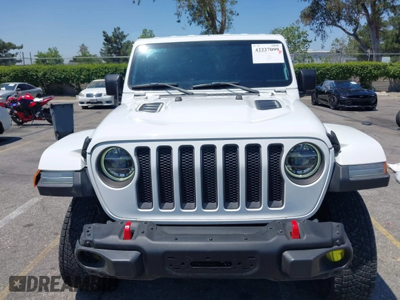 2018 Jeep Wrangler Unlimited Rubicon with VIN 1C4HJXFN8JW215023, listed as a IAAI auction lot 42227099 with 62,195 mi miles and . Bid and sale history available at DreamBid. Image 12.