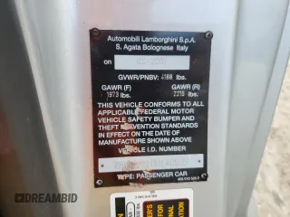 2007 Lamborghini Gallardo z VIN ZHWGU22T57LA05137, wystawiony jako Copart lot #76275354 z przebiegiem Nie podano mil oraz Szkody całkowita. Historia ofert i sprzedaży dostępna na DreamBid. Obrazek 12.