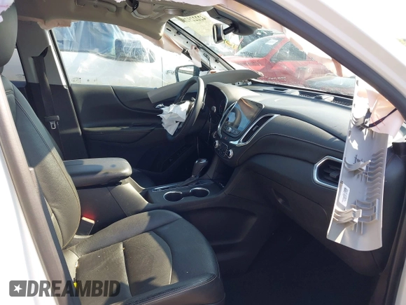 2021 Chevrolet Equinox Premier z VIN 2GNAXNEV9M6120241, wystawiony jako IAAI lot #42222928 z przebiegiem 104 274 mil mil oraz . Historia ofert i sprzedaży dostępna na DreamBid. Obrazek 5.