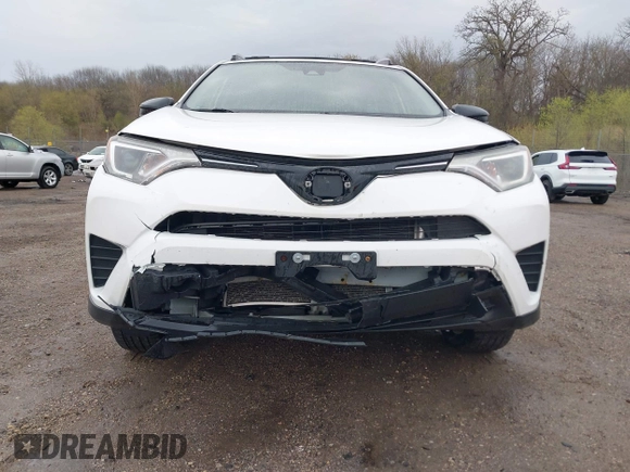 2018 Toyota RAV4 LE with VIN JTMBFREV8JJ722277, listed as a IAAI auction lot 42075684 with 203,458 mi miles and . Bid and sale history available at DreamBid. Image 6.