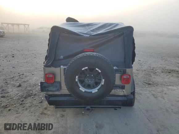 2005 Jeep Wrangler SE with VIN 1J4FA29105P344743, listed as a Copart auction lot 75524944 with 108,824 mi miles and Salvage Title. Bid and sale history available at carsss.com. Image 6.