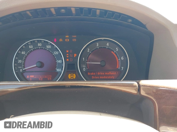 2006 BMW 7 Series 750Li with VIN WBAHN83546DT60302, listed as a IAAI auction lot 41980755 with 109,552 mi miles and . Bid and sale history available at DreamBid. Image 7.