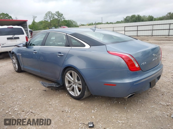 2013 Jaguar XJ with VIN SAJWA2G17DLV57561, listed as a IAAI auction lot 41928575 with 108,794 mi miles. Bid and sale history available at carsss.com. Image 3.