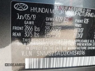 2019 Hyundai Santa Fe SE with VIN 5NMS23AD2KH134016, listed as a IAAI auction lot 41977240 with 61,448 mi miles and . Bid and sale history available at DreamBid. Image 9.