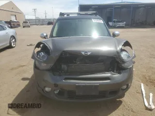 2013 MINI Countryman S ALL4 z VIN WMWZC5C56DWM16203, wystawiony jako Copart lot #54346425 z przebiegiem 148 065 mil mil oraz Szkoda całkowita • Salvage title. Historia ofert i sprzedaży dostępna na DreamBid. Obrazek 5.