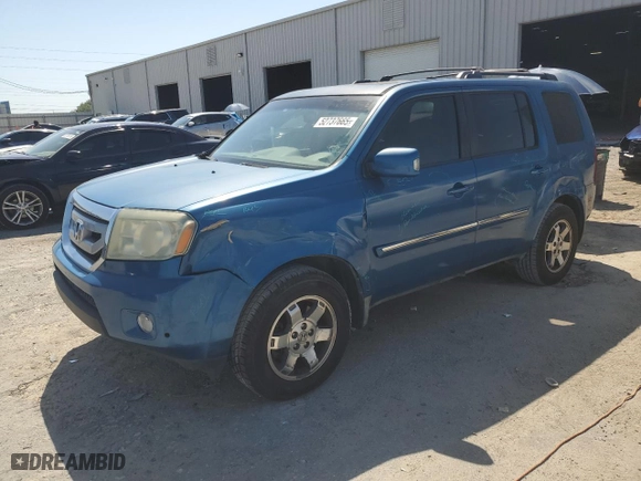 2011 Honda Pilot Touring with VIN 5FNYF4H9XBB083310, listed as a Copart auction lot 52737665 with 209,952 mi miles and Salvage Title. Bid and sale history available at carsss.com. Image 1.