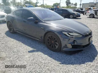 2016 Tesla Model S 90D with VIN 5YJSA1E27GF171698, listed as a Copart auction lot 49176205 with 107,913 mi miles and Salvage Title. Bid and sale history available at DreamBid. Image 4.