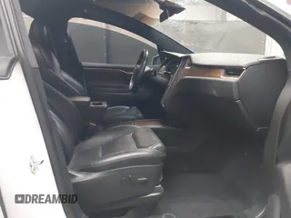 2020 Tesla Model X Long Range with VIN 5YJXCDE22LF305223, listed as a IAAI auction lot 41989862 with 48,309 mi miles. Bid and sale history available at carsss.com. Image 5.