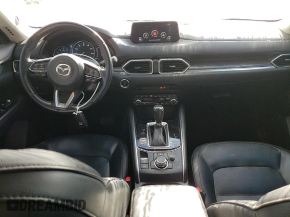 2020 Mazda CX-5 Grand Touring with VIN JM3KFBDM9L1820907, listed as a Copart auction lot 86166054 with 34,007 mi miles and Salvage Title. Bid and sale history available at carsss.com. Image 8.