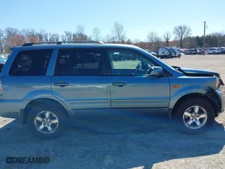 2006 Honda Pilot EX-L with RES with VIN 2HKYF18626H505792, listed as a IAAI auction lot 41861686 with 180,551 mi miles. Bid and sale history available at carsss.com. Image 13.