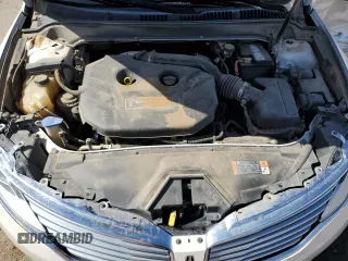 2014 Lincoln MKZ z VIN 3LN6L2G91ER820544, wystawiony jako Copart lot #56049535 z przebiegiem 211 323 mil mil oraz Szkoda całkowita • Salvage title. Historia ofert i sprzedaży dostępna na DreamBid. Obrazek 11.