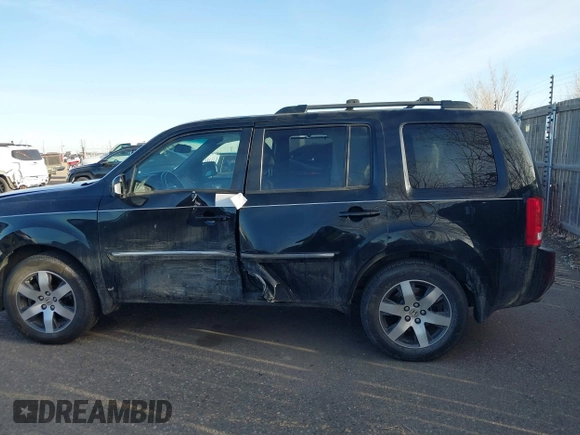 2012 Honda Pilot Touring with VIN 5FNYF4H93CB077057, listed as a IAAI auction lot 41156160 with 139,834 mi miles and . Bid and sale history available at DreamBid. Image 14.