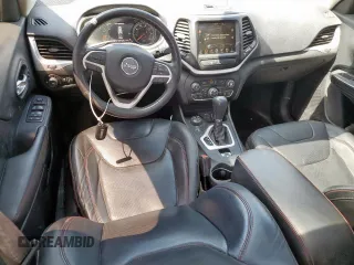 2015 Jeep Cherokee Trailhawk с VIN 1C4PJMBS2FW504041, выставлен на аукционе Copart как лот 66968245 с пробегом 129 312 миль миль и Чистый • Clean title. История ставок и продаж доступна на DreamBid. Изображение 8.